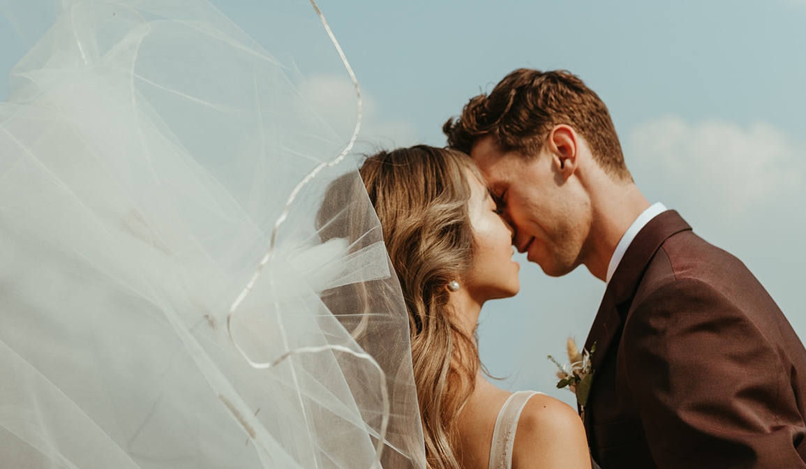 bride and groom kissing