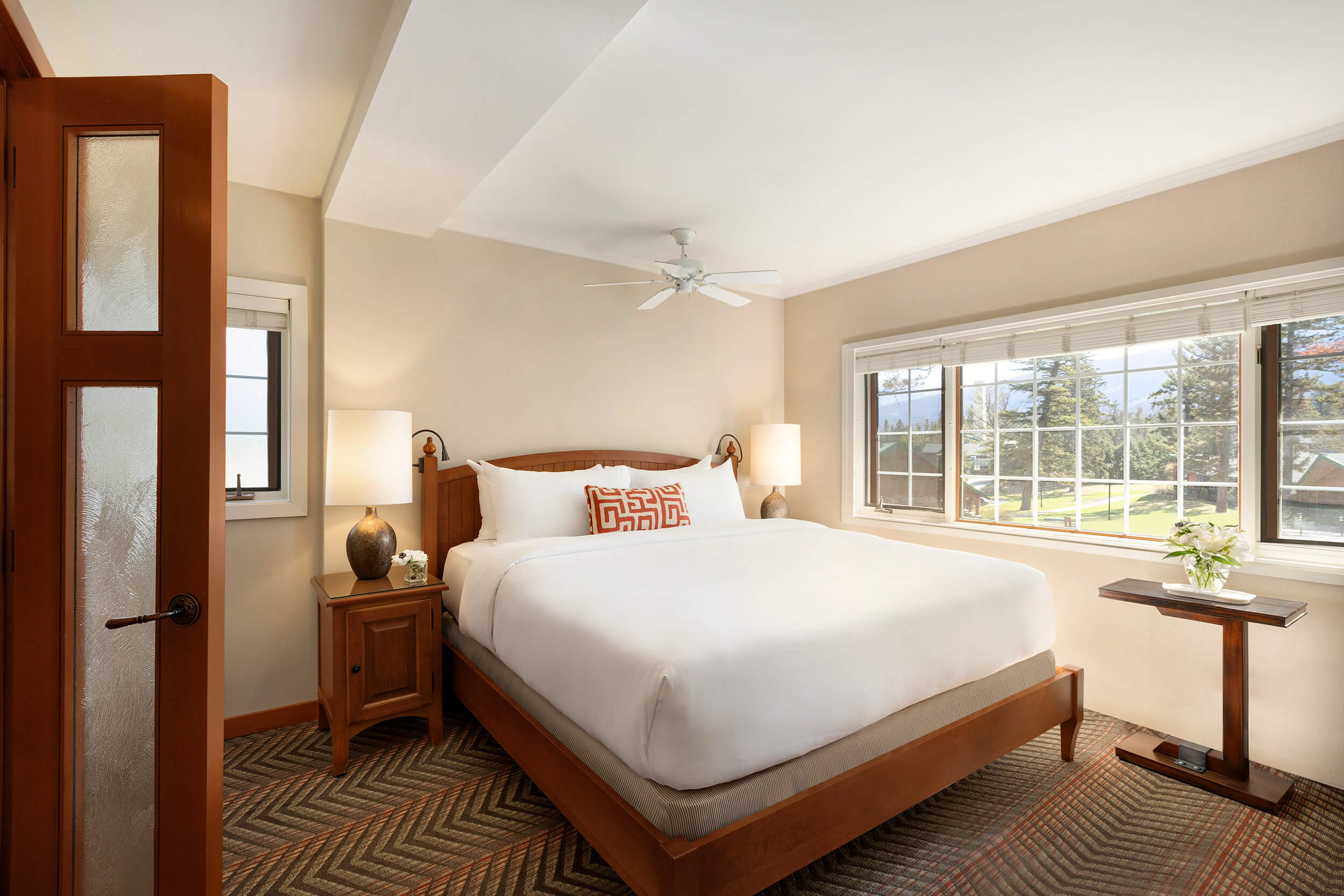 bedroom with view of grounds