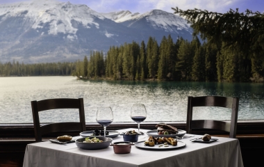 orso annex dinner table by lake and mountains