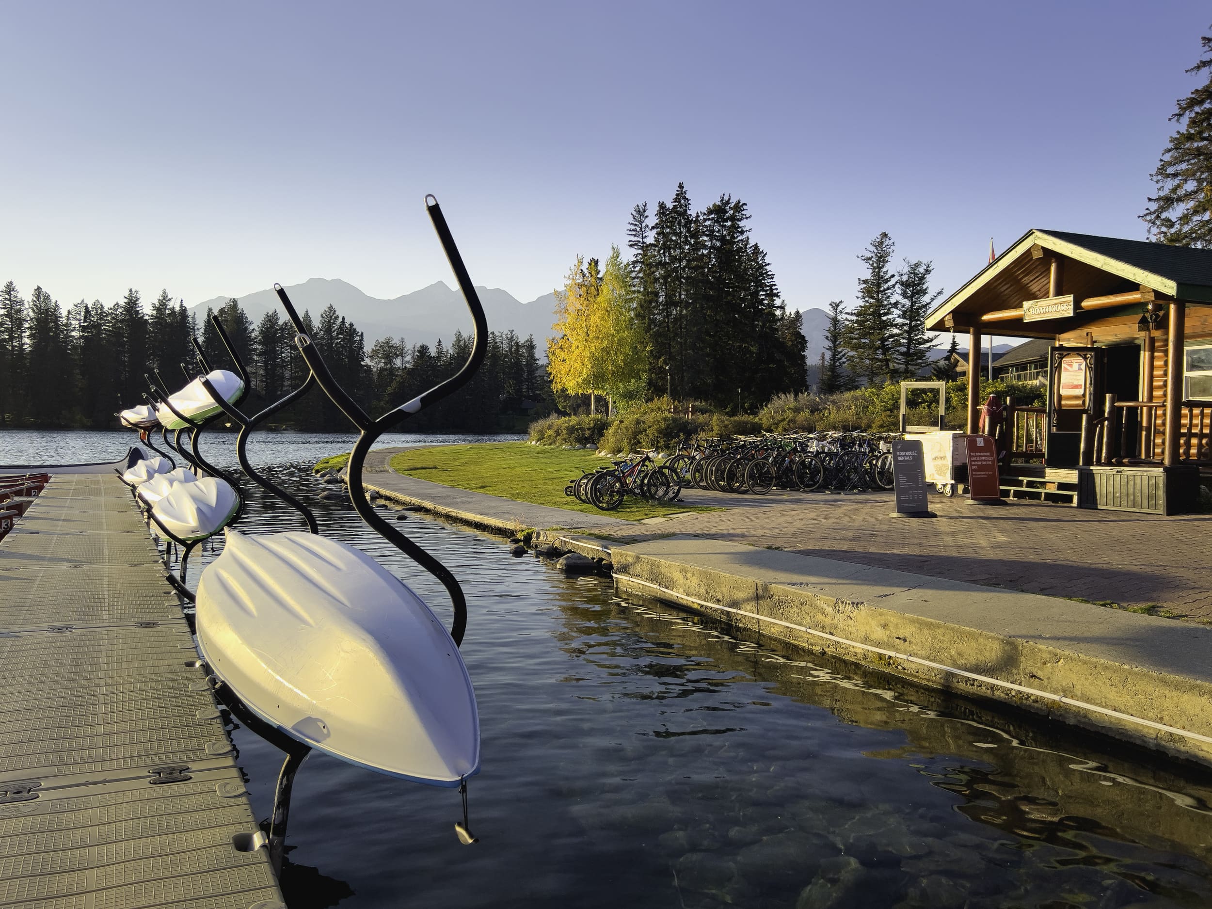 bicycles and canoes for rent by lake