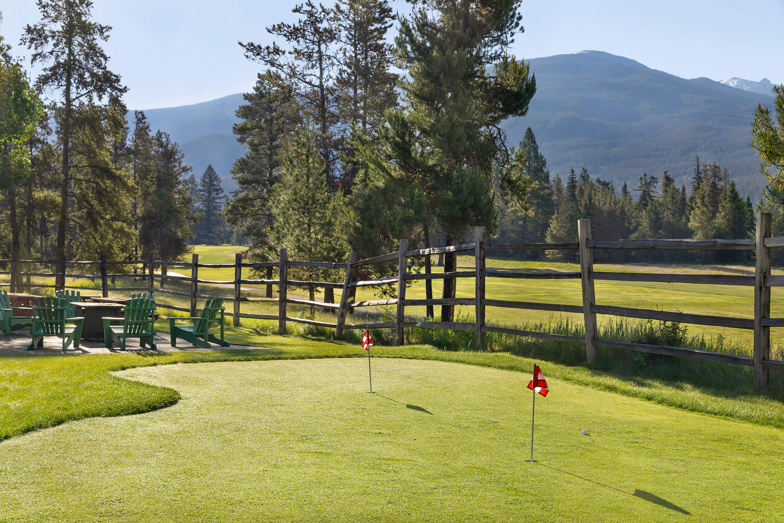 putting green and mountains backdrop