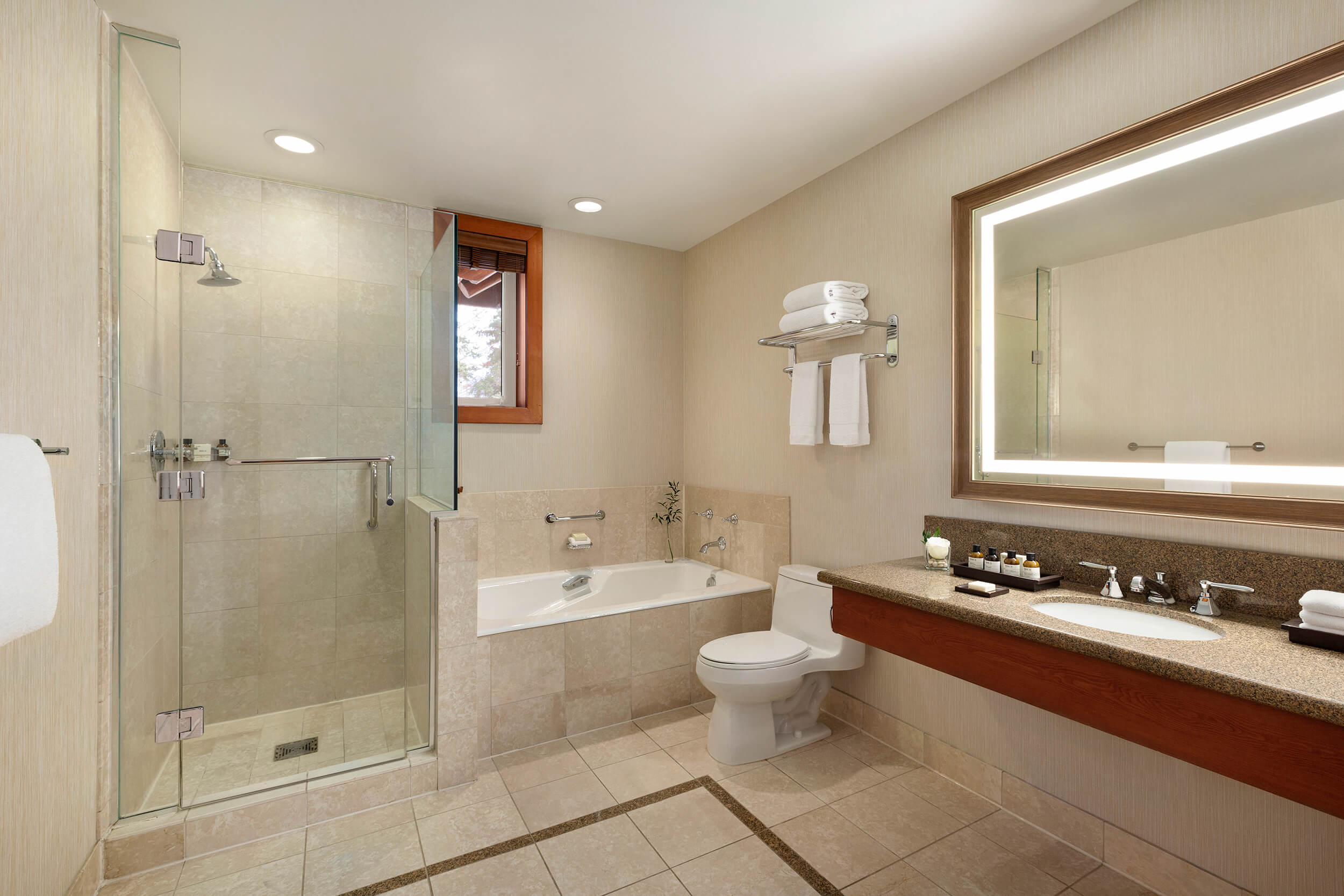 bathroom with bathtub and walk-in shower