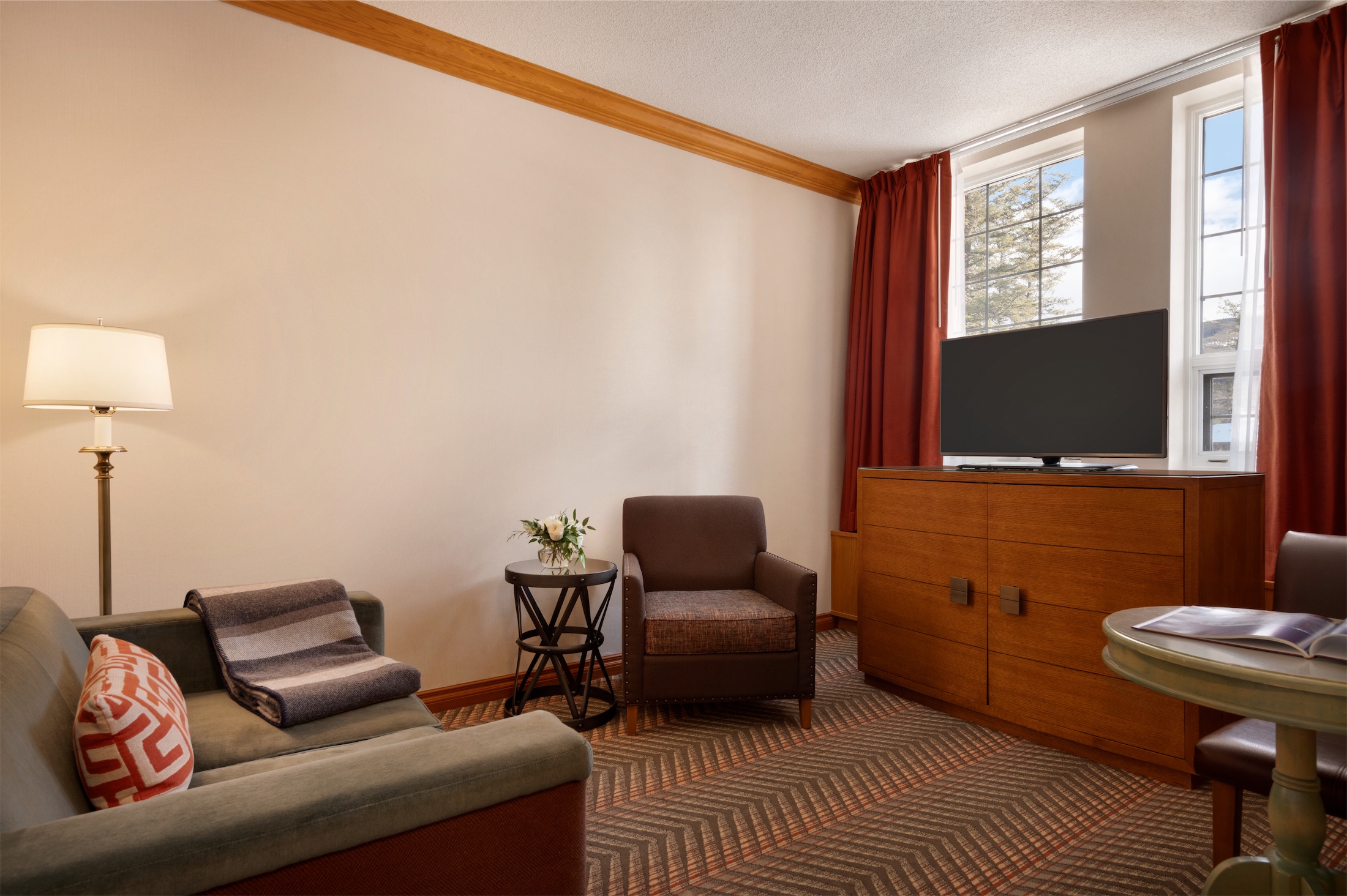 living room with love seat and chair