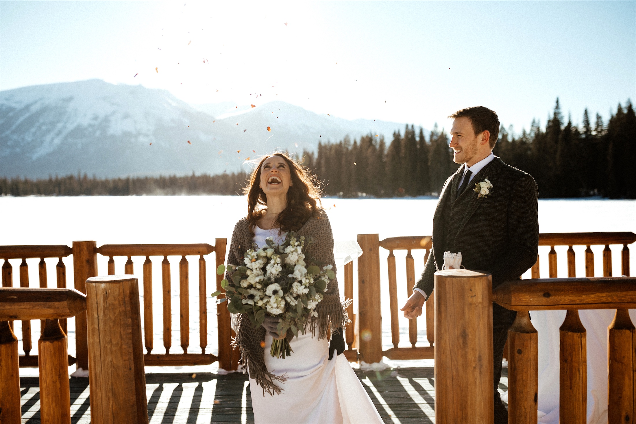 bride and groom on the sundeck in winter