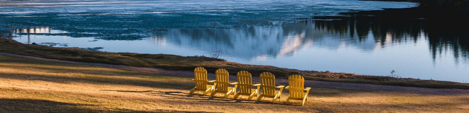 Chairs by lake