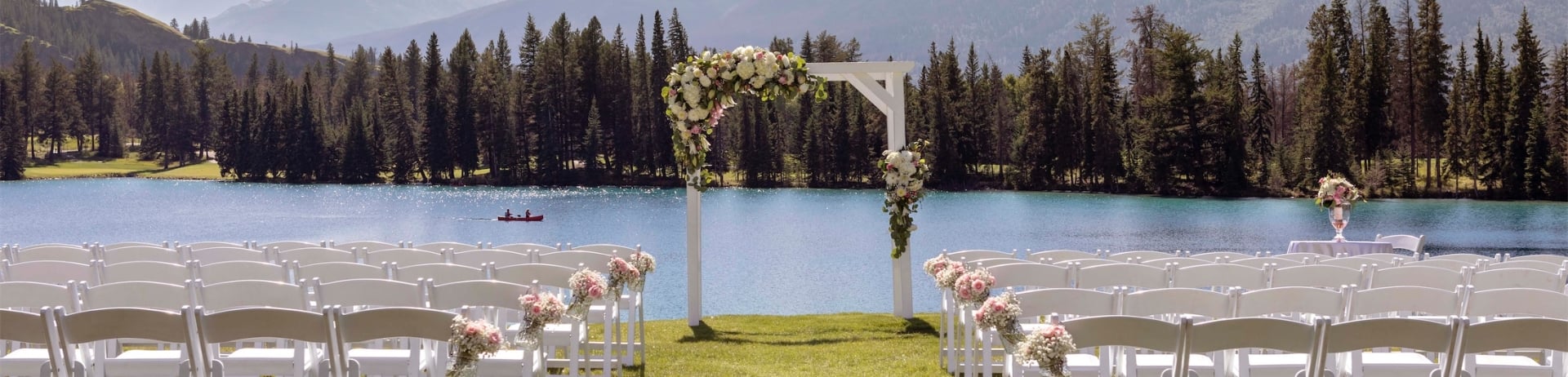 wedding venue by lake and mountains