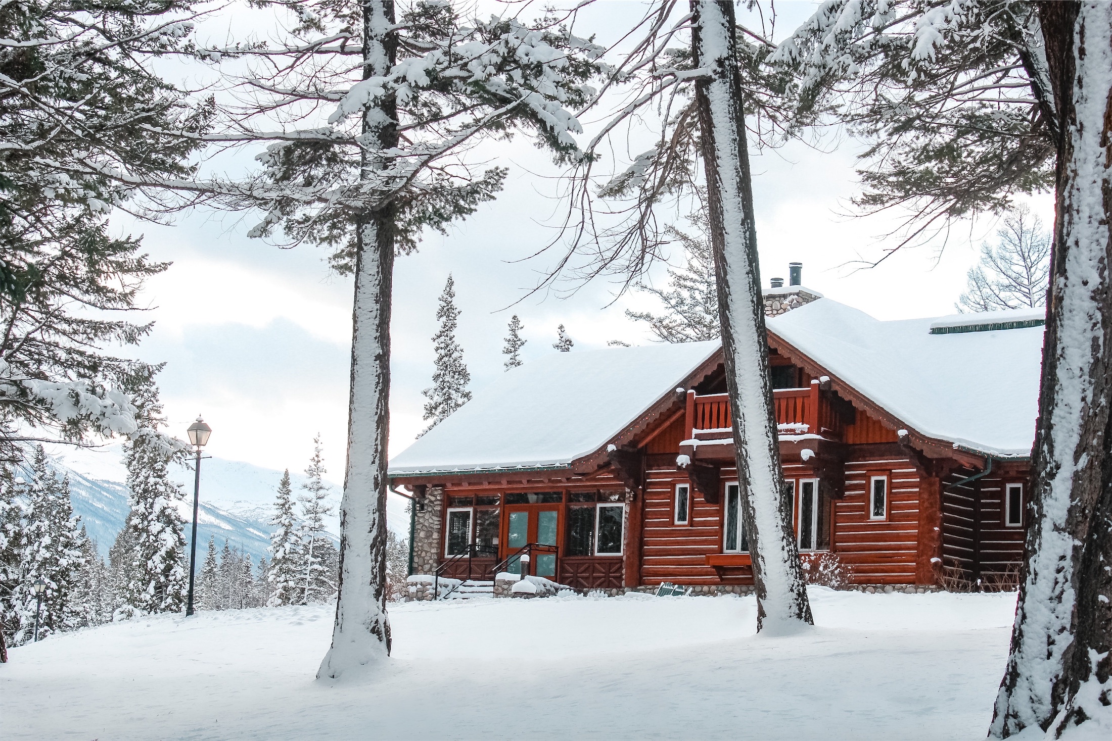 A signature cabin at Fairmont Jasper Park Lodge in winter