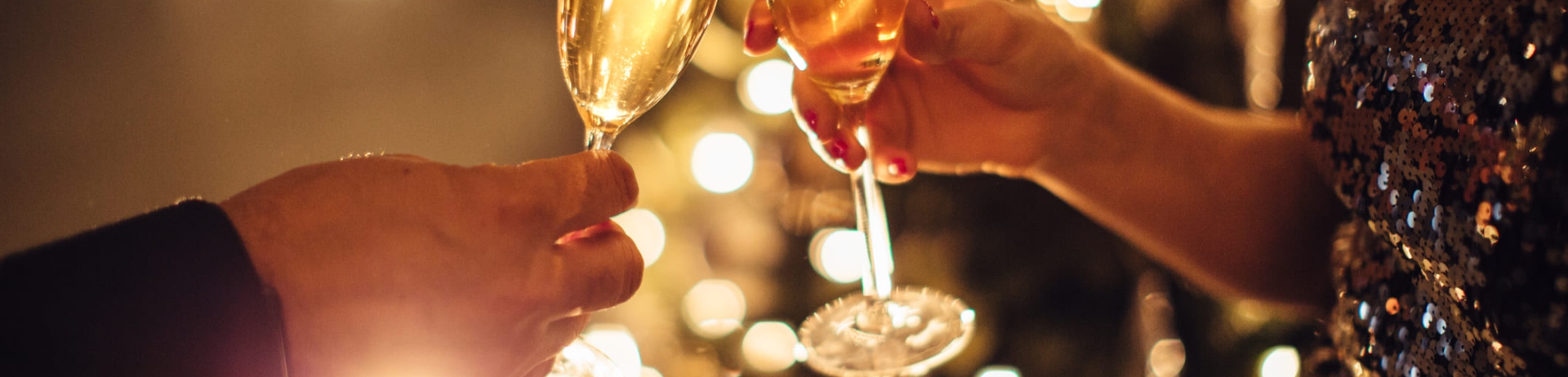 two glasses of champagne toasting