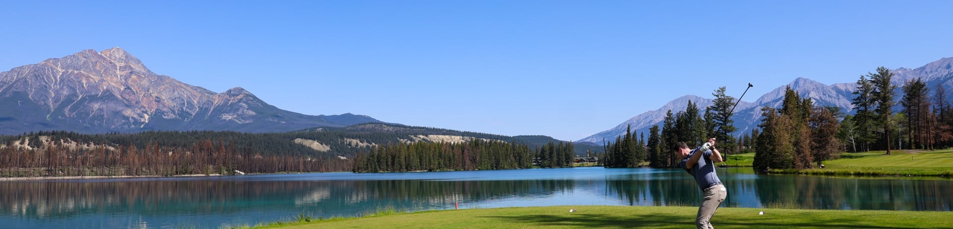Fairmont Jasper Park Lodge - Hole 14 - Lac Beauvert - Golfer Teeing Off