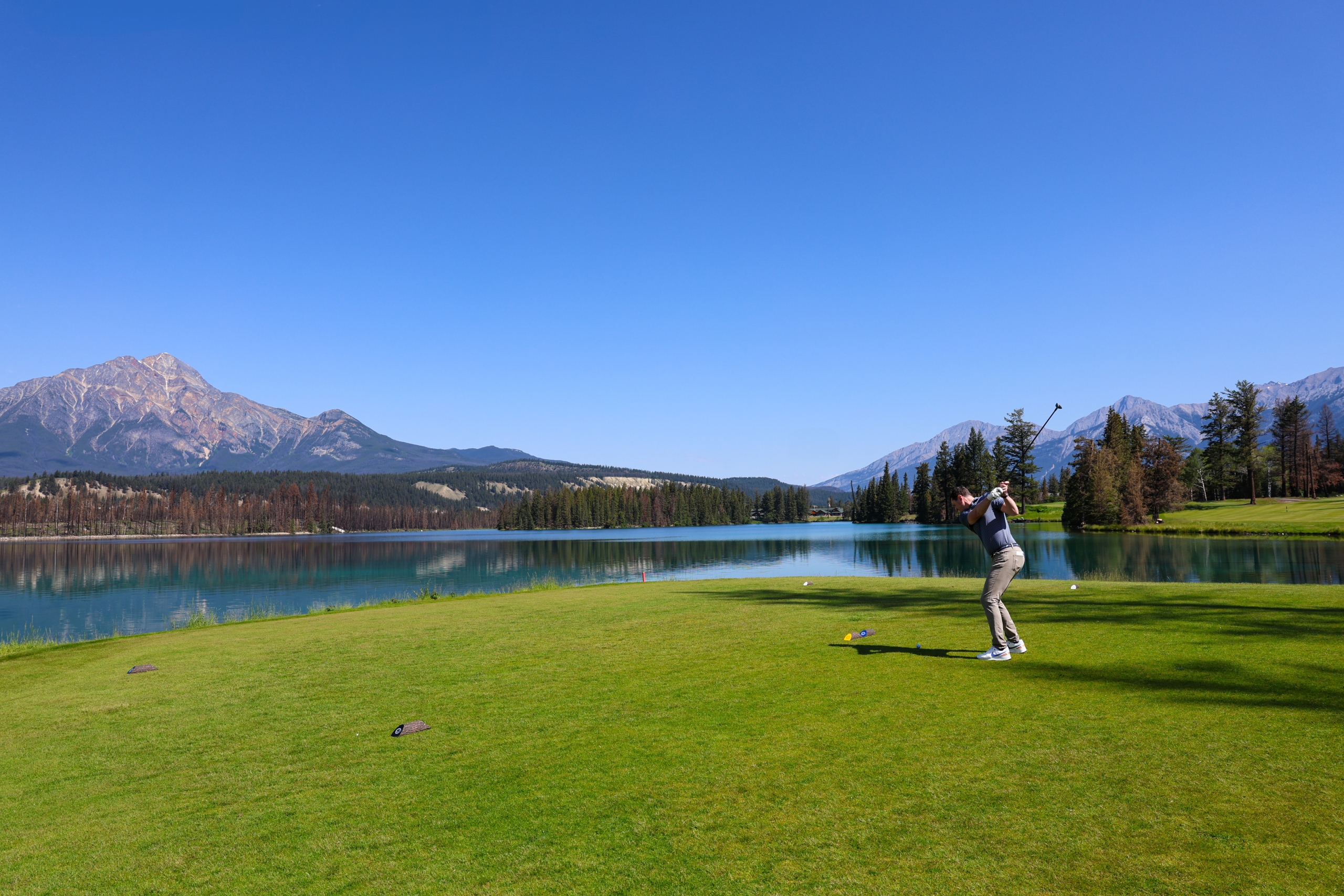 Fairmont Jasper Park Lodge - Hole 14 - Lac Beauvert - Golfer Teeing Off