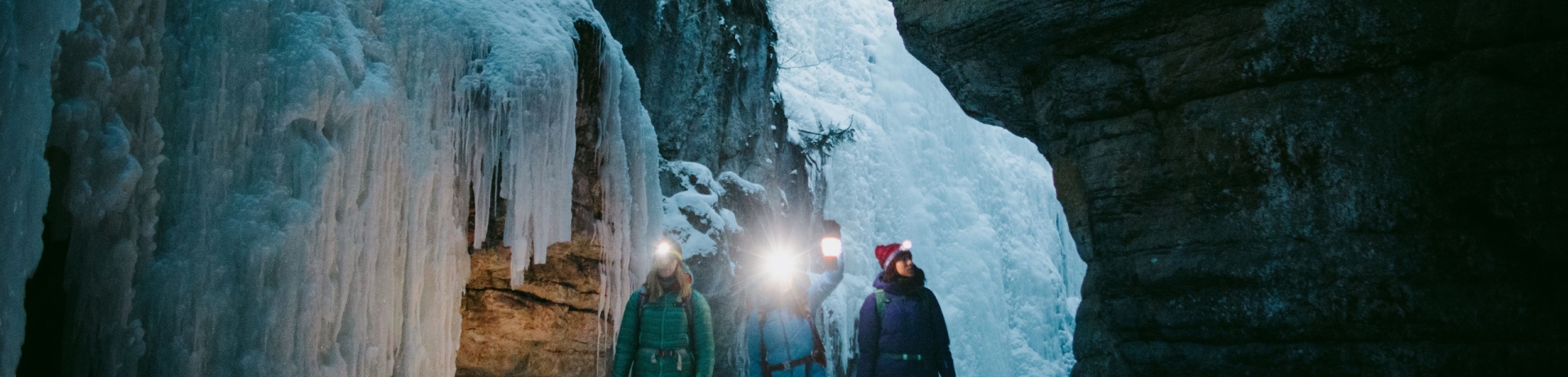 A group explores the ice caves of Magline Canyon in Jasper
