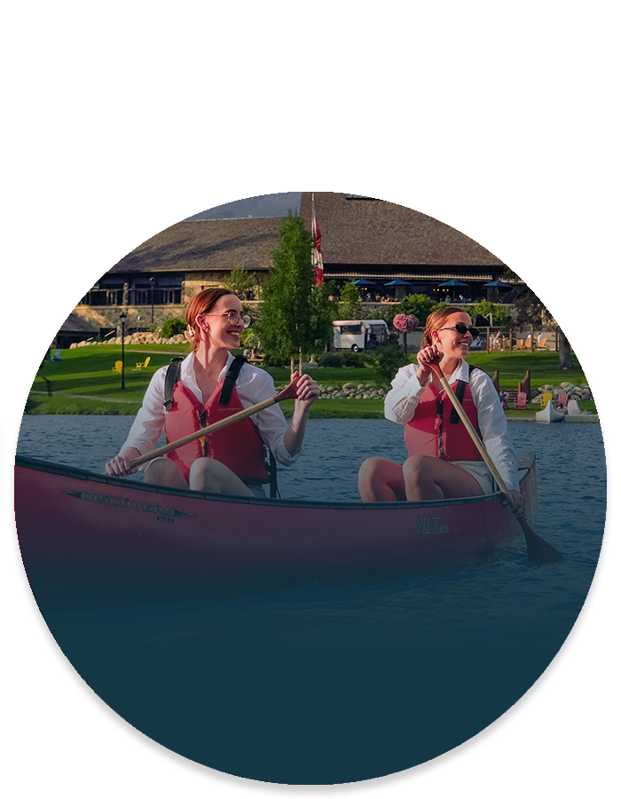 Friends in a canoe on Lac Beauvert