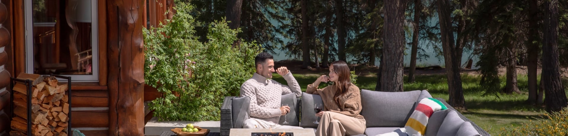 Couple enjoying a nice summer day on their in room patio.