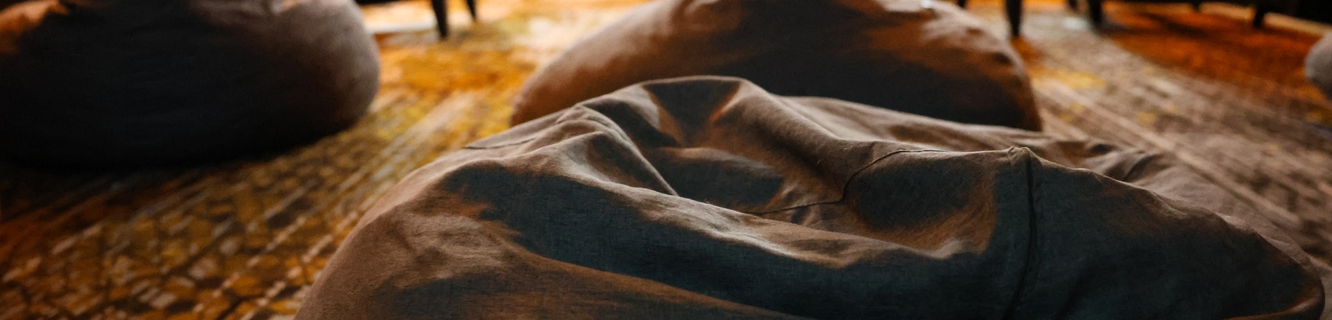 Cozy theatre room with bean bag chairs and plush seating at Fairmont Jasper Park Lodge