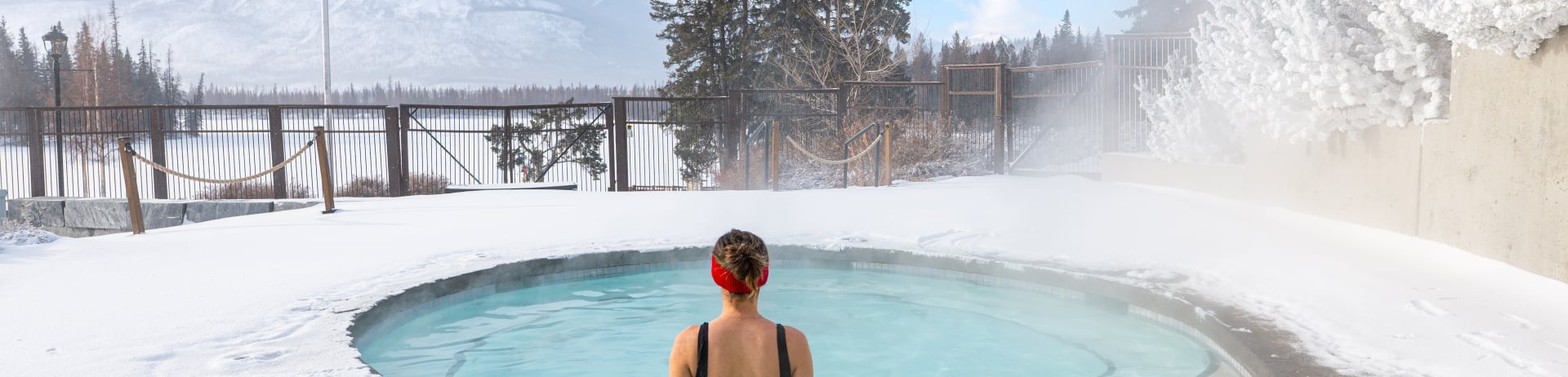 Woman in heated outdoor pool