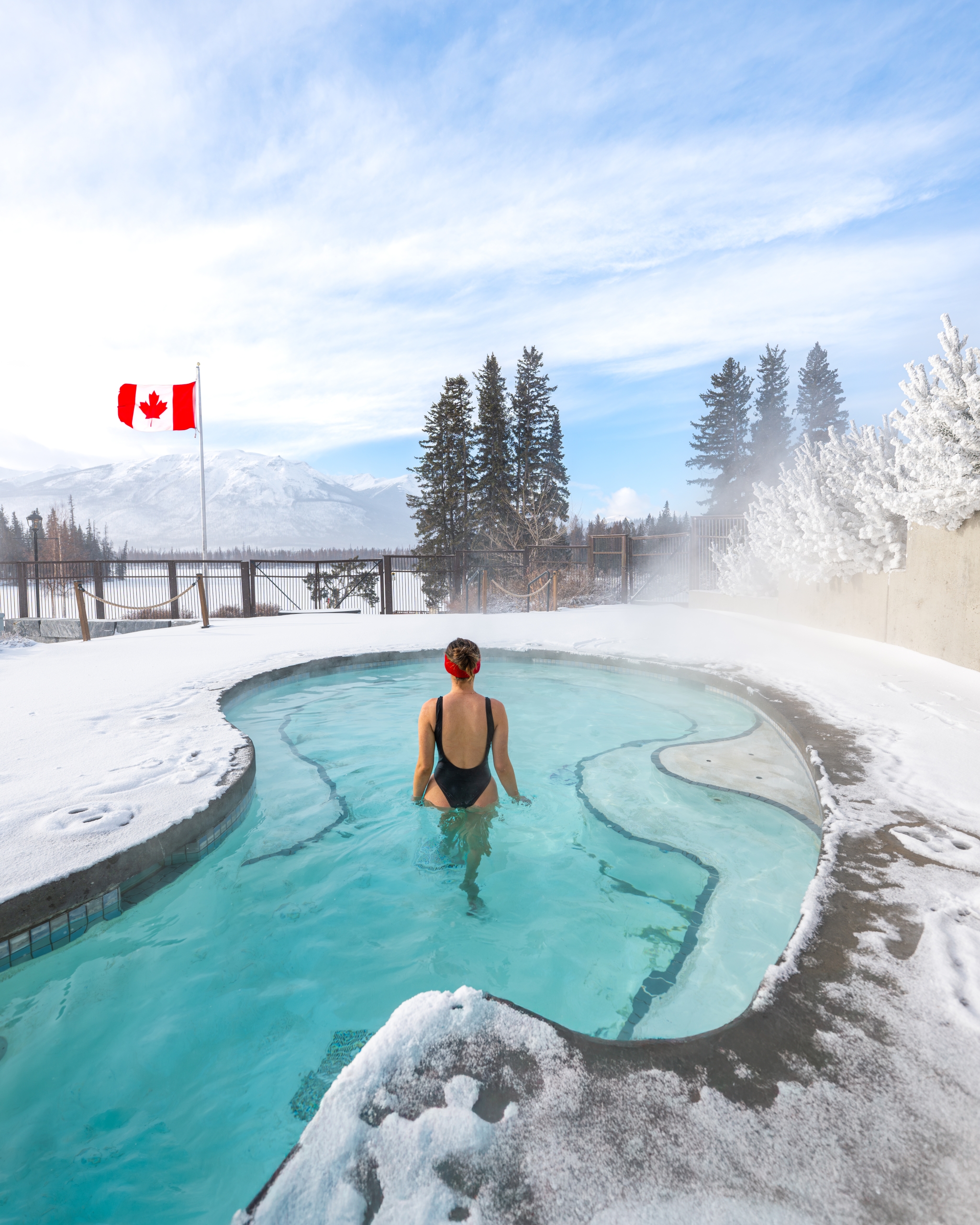 Woman in heated outdoor pool