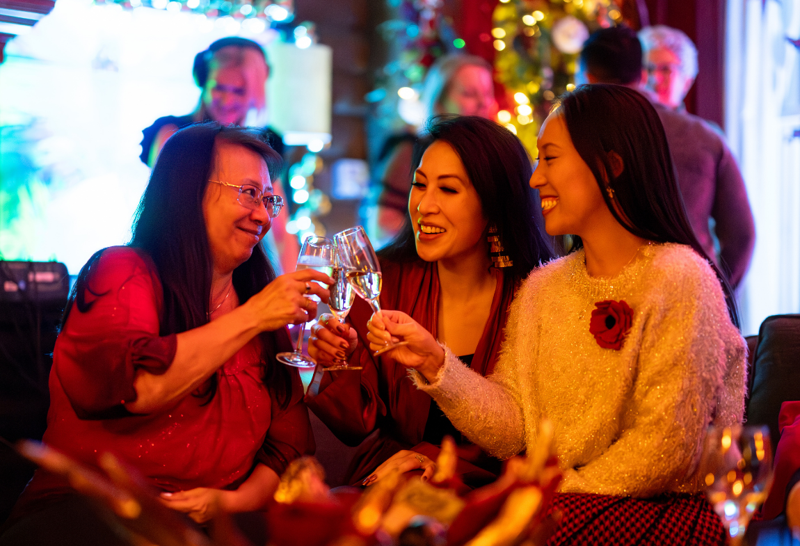 3 Women celebrating Christmas.