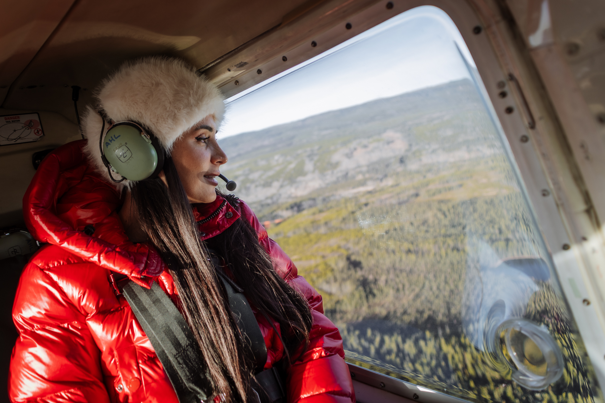 Woman in a helicopter.