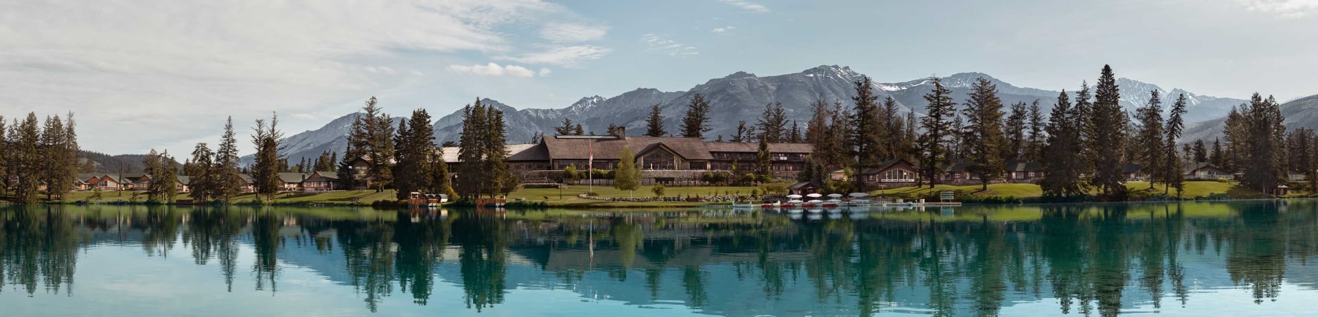 Image of Fairmont Jasper Park Lodge across the lake.