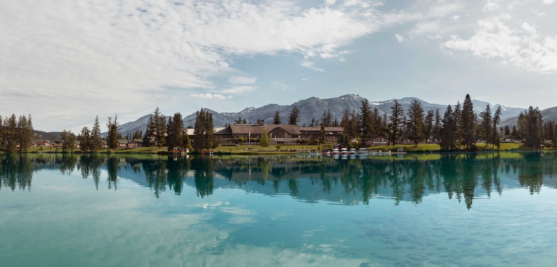 Image of Fairmont Jasper Park Lodge across the lake.