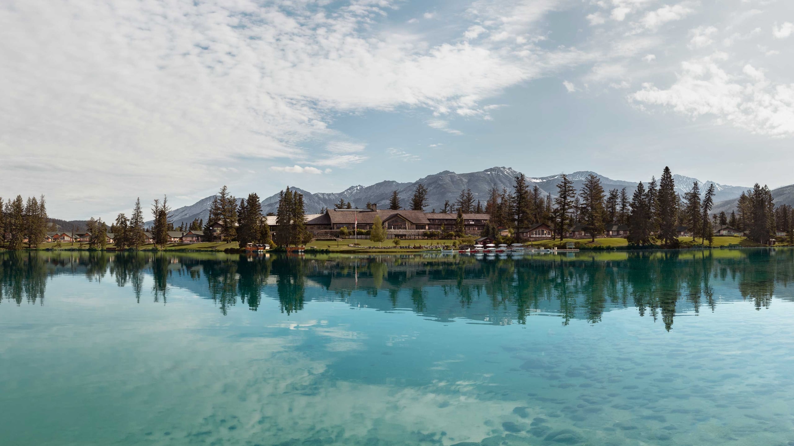 Image of Fairmont Jasper Park Lodge across the lake.