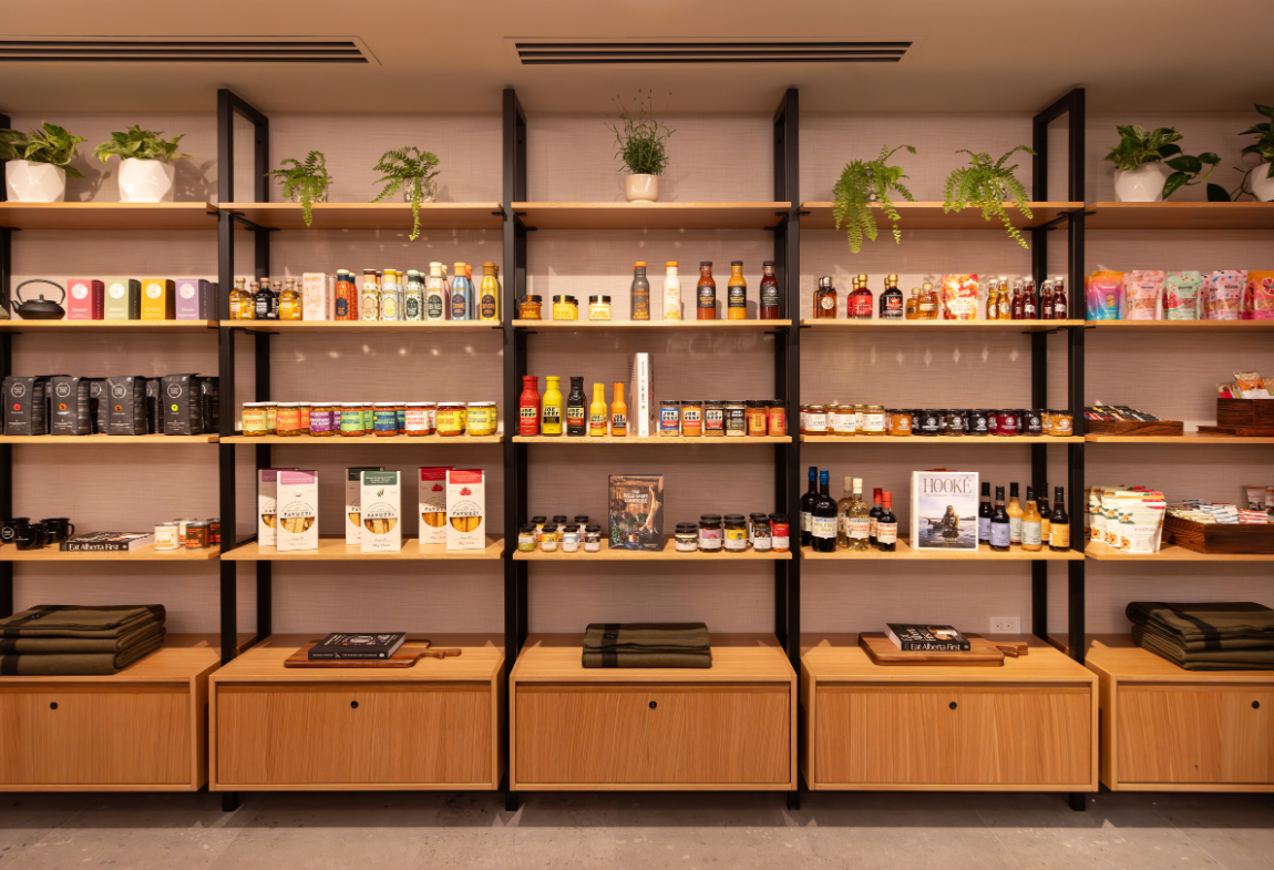 Curated provisions from Embark Provisions and Outpost, featuring artisanal snacks, local goods, and gourmet essentials thoughtfully arranged for adventure and exploration.