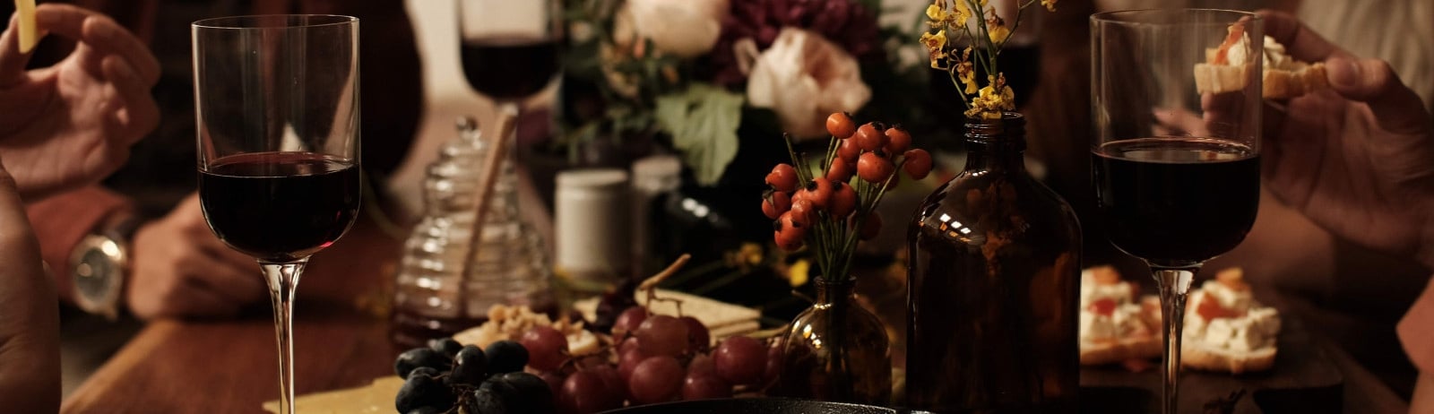 Thanksgiving dinner table shared amongst family.