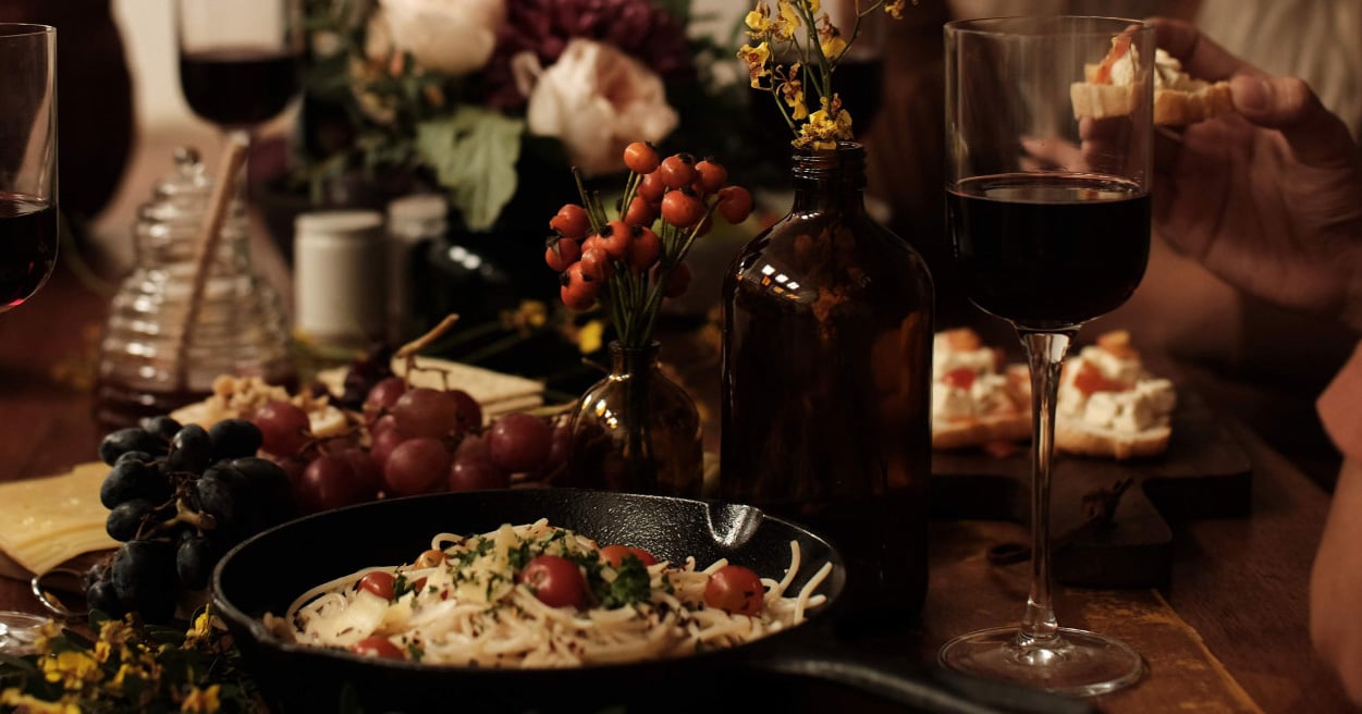 Thanksgiving dinner table shared amongst family.
