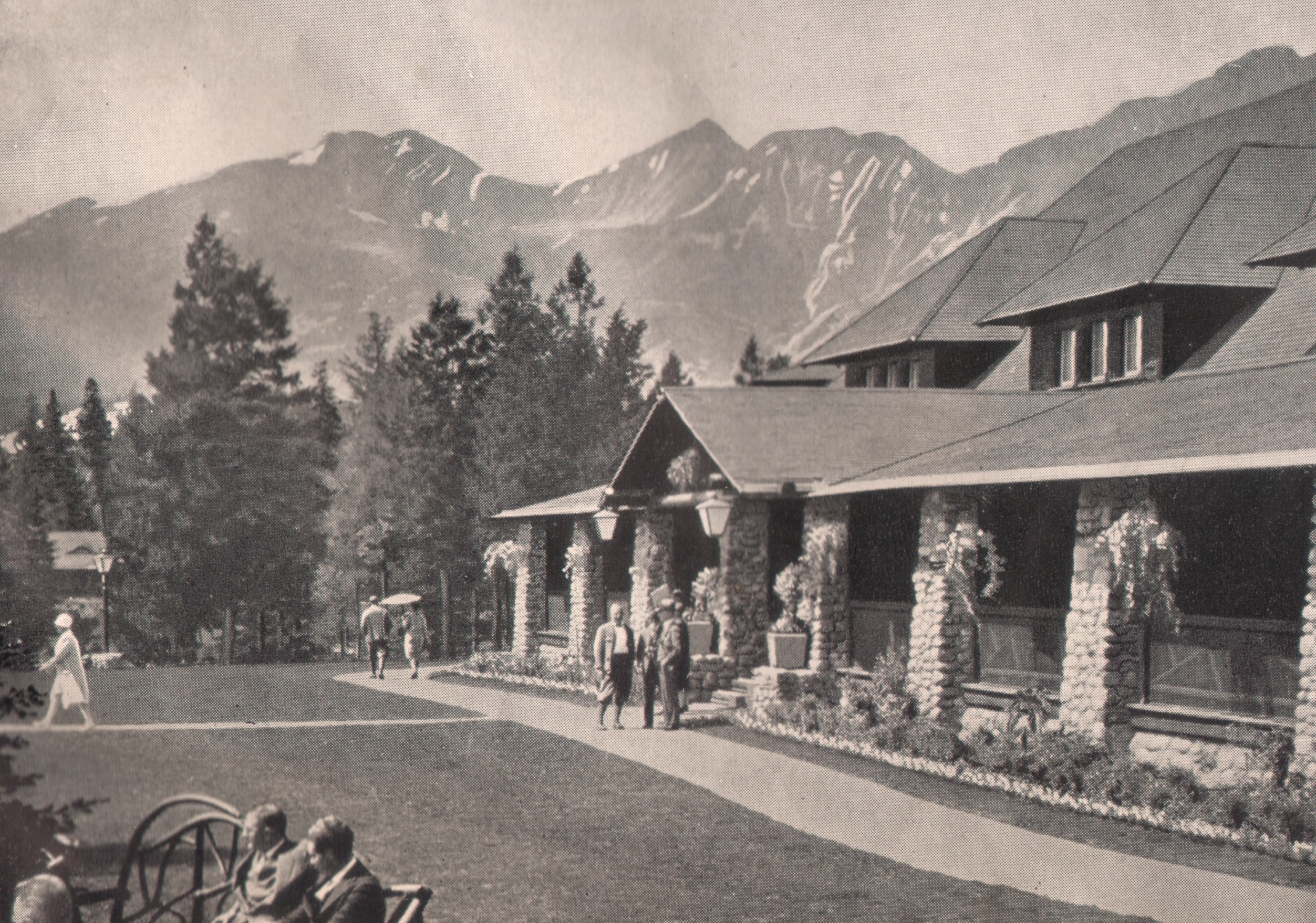 Historical image of guests standing in front of Fairmont Jasper Park Lodge.